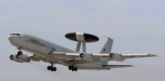 NATO AWACS aircraft taking off from an airfield