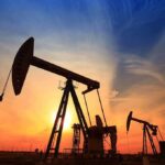 Behind the “Deadliest State” Label: Real Story Unveiled Silhouetted oil pumps against a colorful sunset sky