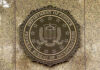 FBI Busts Alleged ISIS Plot FBI seal on a marble wall.