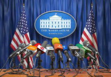Risky Terms: Trump Iran Deal Push Faces Questions Multiple microphones at White House press briefing podium.