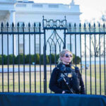 Mother’s Warning Thwarts Alleged White House UFC Terror Plot Secret Service agent stands guard outside the White House.