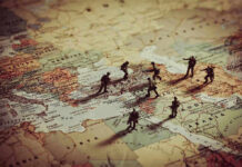 Europe’s Hidden Crime Army Is Bigger Than Most People Realize Toy soldiers on a world map background.