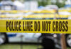 Global Suicide Scheme Ends in Guilty Plea Yellow police line tape with Do Not Cross.