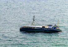 Pentagon Denies: Ecuador Fishermen Allege U.S. Drone Attack An abandoned boat floating on the ocean surface