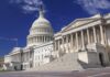 National Football League Slaps By Congress Over Paywalls The U.S. Capitol building with its dome and columns under a blue sky