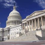 National Football League Slaps By Congress Over Paywalls The U.S. Capitol building with its dome and columns under a blue sky