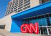 Supreme Showdown: Trump, CNN, And A $400M Ballroom Exterior view of the CNN headquarters with a large red logo and blue entrance