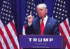 “Nobody Can Be Like Us”: Trump’s Boldest America 250 Message Yet Man speaking at podium with USA flags behind him.