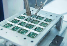 A Chip Giant Just Made a €5 Billion Bet on AI Robotic arm assembling electronic circuit boards in production.
