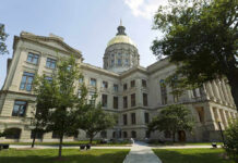 Michigan Governor’s Pardon Erases Nearly 50-Year-Old Murder Conviction Historic building with a gold dome and surrounding trees.