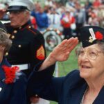 One 103-Year-Old Veteran Reminded America Elderly women in military attire saluting during a veterans ceremony