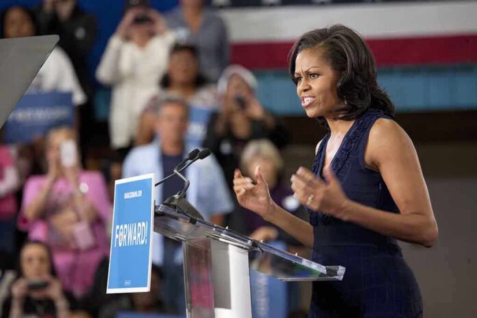 shutterstock_132476657 A female speaker passionately addressing a crowd at a campaign event