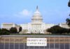 Unverified Claims Spark Online Speculation View of the U.S. Capitol building with a security barrier in front