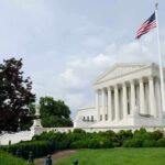 Deadly Attack: One Word Sparks National Debate The U.S. Supreme Court building with an American flag and landscaped grounds