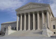 Judge Orders $1.7 Million Payment to Hunter The Supreme Court building featuring large columns and statues