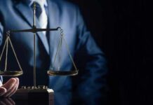 Chilling Timeline: The Jury Must Decide Scales of justice held by a person in a suit
