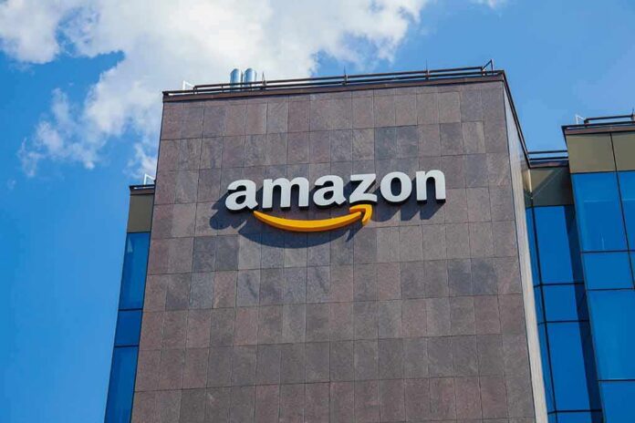 shutterstock_1080829379 Amazon logo on modern office building facade