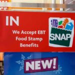 Discount Grocery Plan Triggers New Debate store door sign indicating EBT SNAP acceptance