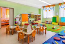 Preschool classroom with colorful furniture and toys