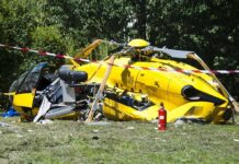Deadly News Chopper Crash in L.A. yellow helicopter crash scene on grassy field