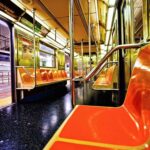 Brutal Attack on Sleeping Rider in The Subway Empty subway car with orange seats and open doors