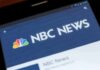 Hypocrisy Flare-Up: Campaign Signs Spark Backlash NBC News app screen on a smartphone