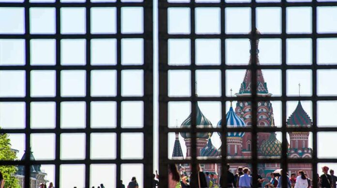 shutterstock_1141752227 St. Basil's Cathedral seen through a metal grid