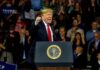 Midterms Teeter: Americans Sour on the Economy Donald Trump speaking at a rally behind a presidential podium