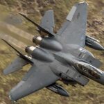 Shock Reversal: Warthog Survives Retirement Plans Fighter jet banking low over rugged terrain