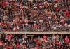 Watson Leads Browns to Big Win Peter Keys in a large stadium crowd of football fans
