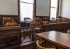 Crowdfund EXPLODES: Holdout Juror Fund Tops $70K Empty jury box in a courtroom with wooden chairs