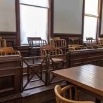 Crowdfund EXPLODES: Holdout Juror Fund Tops $70K Empty jury box in a courtroom with wooden chairs