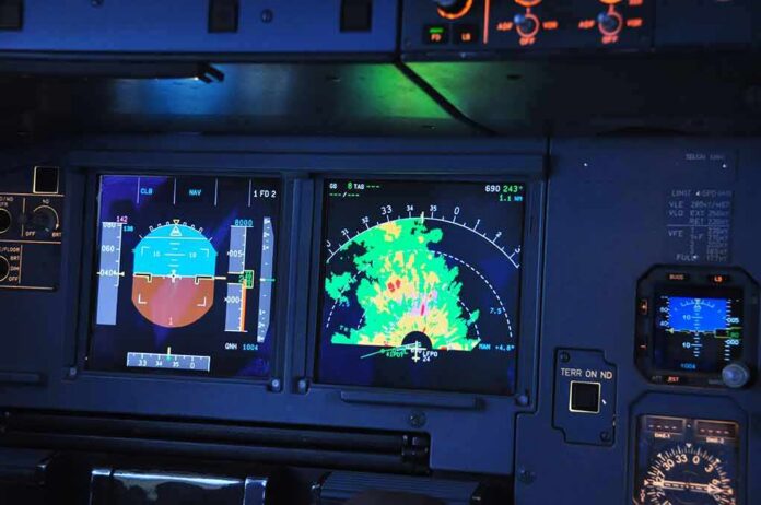 aircraft cockpit displays with attitude indicator and weather radar