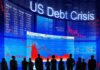 Trump’s Economy Faces Mixed Reviews Silhouetted people watch falling stock charts on a large financial display