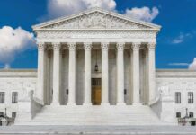 Hearing Highlights Dispute Over DOJ Subpoenas United States Supreme Court building with classical columns