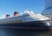 Cruise Crew Purge Stuns Boston Cruise ship docked at a modern harbor terminal