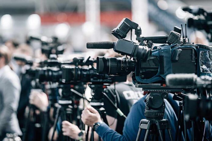 Public,Live,Event,Media,Coverage,,Television,Cameras,At,A,Press Broadcast cameras on tripods at a press event