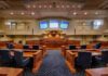 Lineage vs. Broader Eligibility in Reparations Debate Courtroom interior with wooden benches and judge's bench