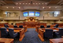 Lineage vs. Broader Eligibility in Reparations Debate Courtroom interior with wooden benches and judge's bench