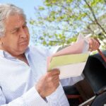 Judge Freezes Mamdani’s New Property Tax Rollout Older man checking mail at a rural mailbox