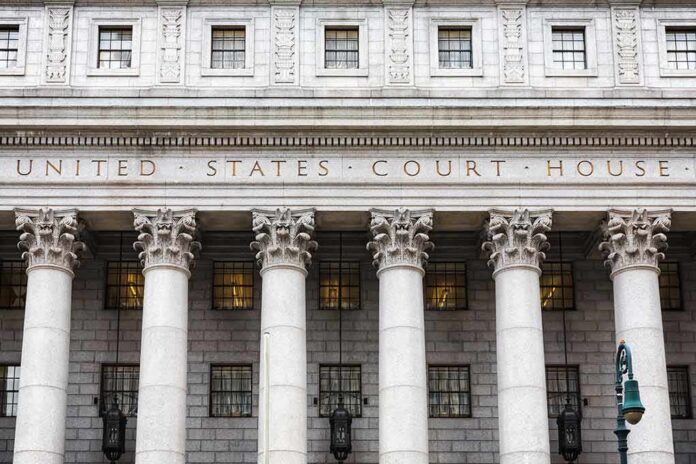 shutterstock_425197420-1 United States courthouse facade with Corinthian columns