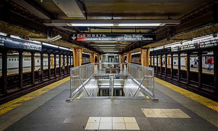 shutterstock_605058719 Subway platform with stairwell and tracks on both sides
