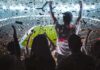 Phillies Clinch Final Wild Card Fans celebrate in a packed stadium with confetti falling