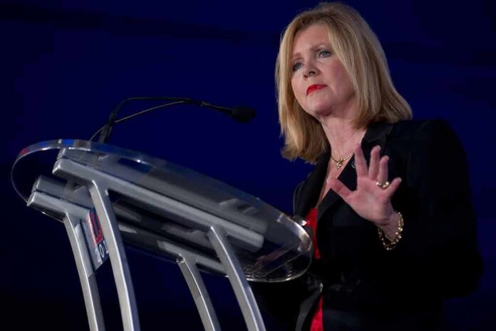 Woman speaking at a podium