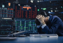 Korea’s Biggest IPO Plunges 30% on Debut Trader stressed out by multiple declining stock charts.