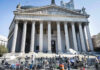 Federal Probe Continues With No Charges Filed Reporters and photographers gathered outside a neoclassical courthouse