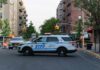 ICE Gunfire Erupts: Bronx Residents Demand Answers NYPD police SUV blocking a city street at a taped-off scene