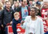 Florida Senate Race Erupts Over “Lock Her Up” Calls Woman addressing a crowd at an outdoor event