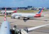 Alleged In-Flight Misconduct Prompts Police Response American Airlines jets taxi at a busy airport apron
