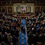 Lawmakers Oppose Execution Livestream Legislative chamber audience stands and applauds